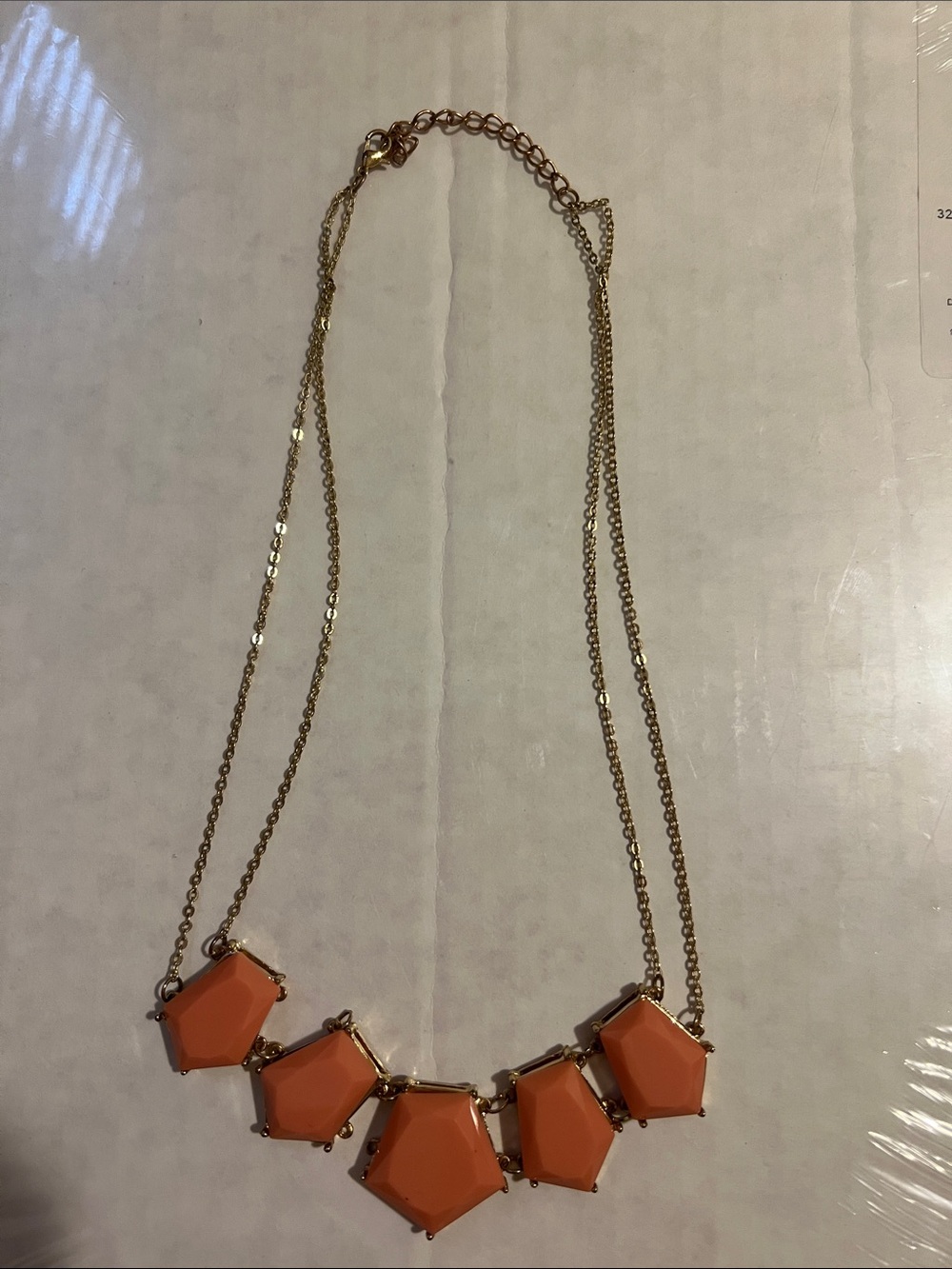 statement necklace/salmon pink color